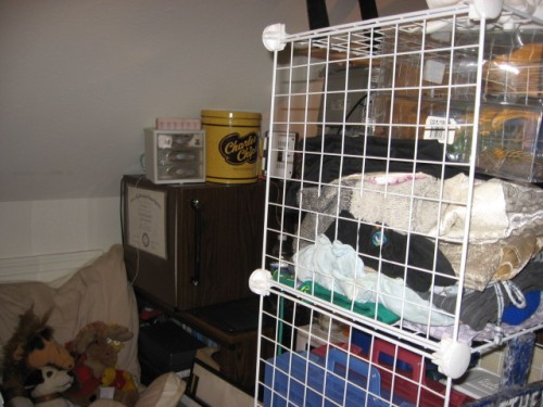 left side of wire cubes in forefront.  In the background is dorm frig. with vintage (yellow) snack can from Charles Chips)